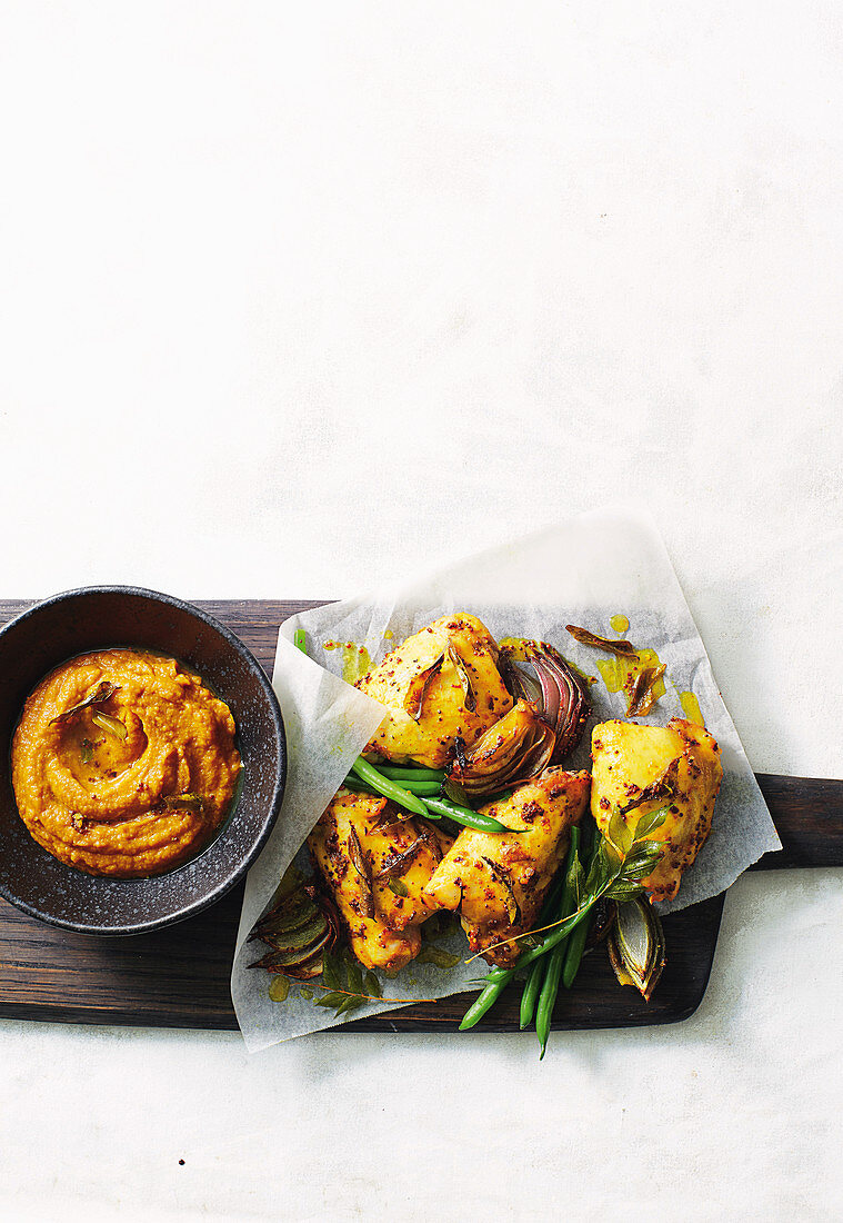 Spiced chicken bake with cumin pumpkin puree