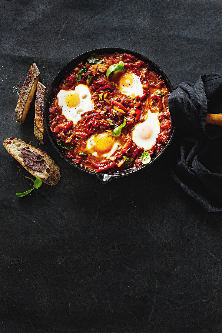 Peperonata baked eggs with tapenade toasts