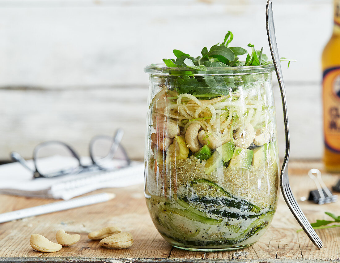 Apple and cucumber noodle salad in a glass