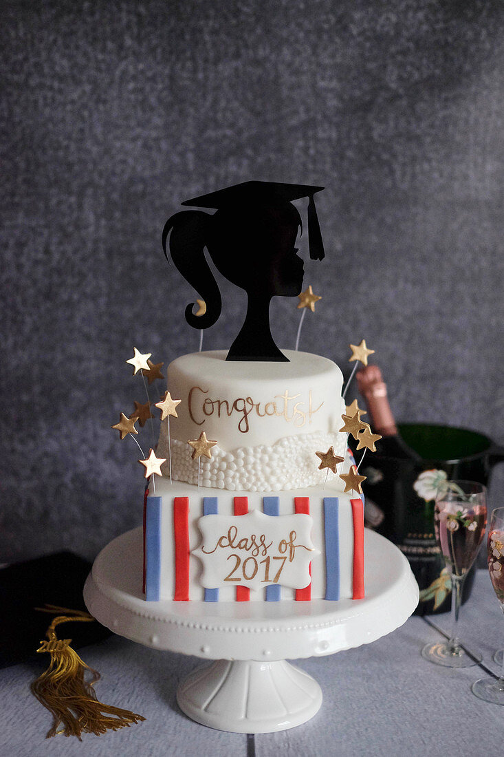 A graduation cake with cinnamon and greengages
