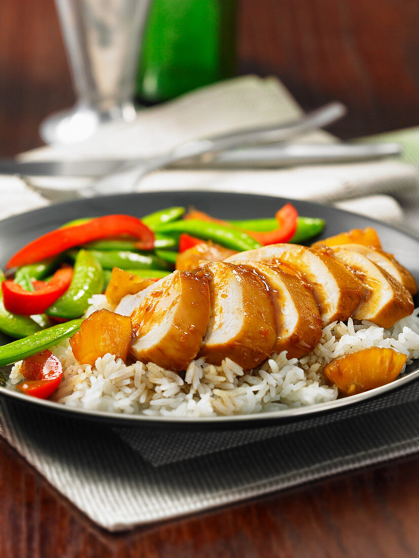 Pineapple chicken with peppers and rice