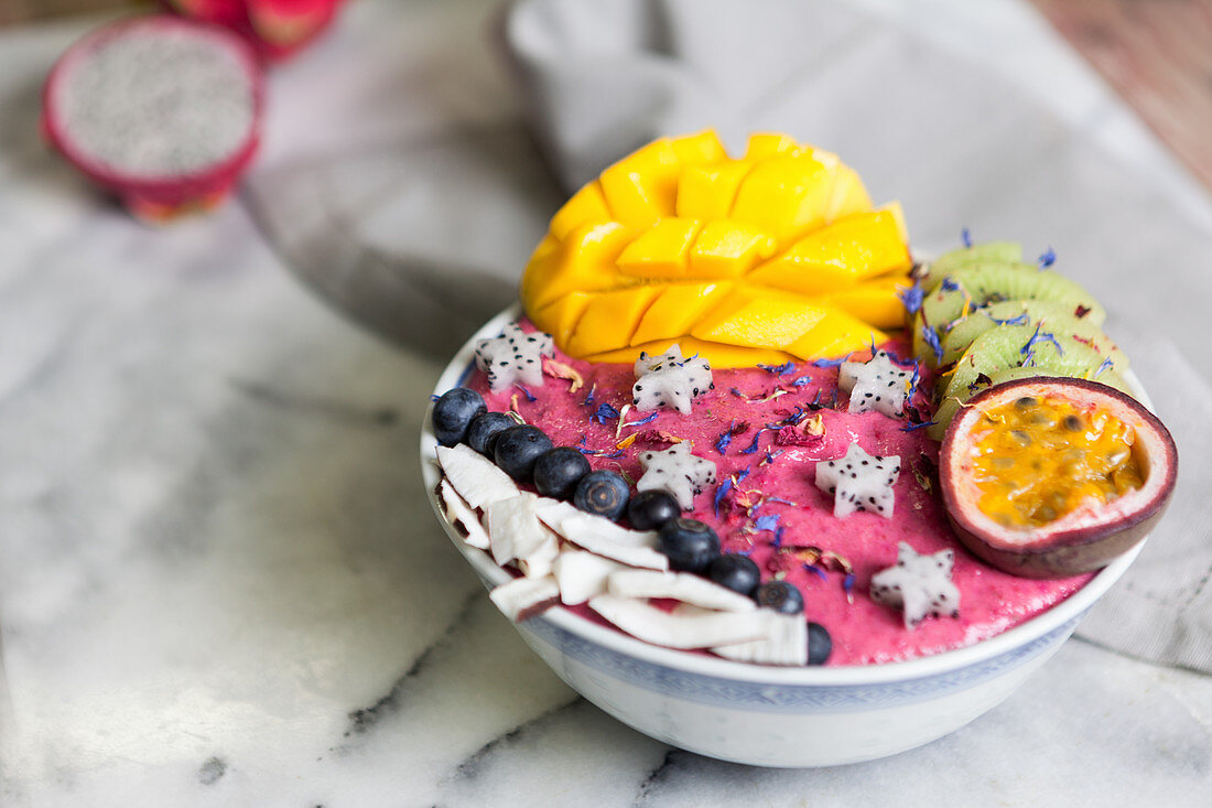 A smoothie bowl with exotic fruit