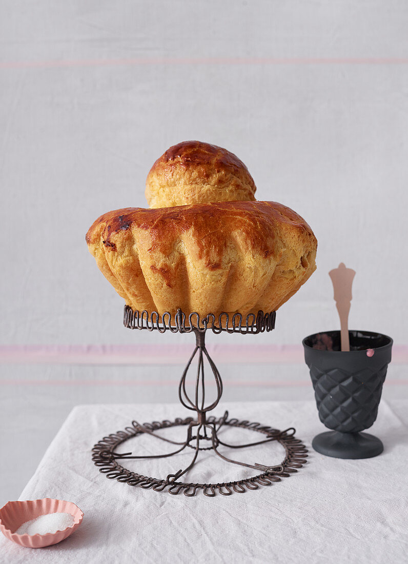 Almond brioche on a wire stand