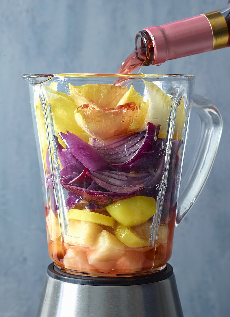 Ingredients for onion and chicory soup in a blender