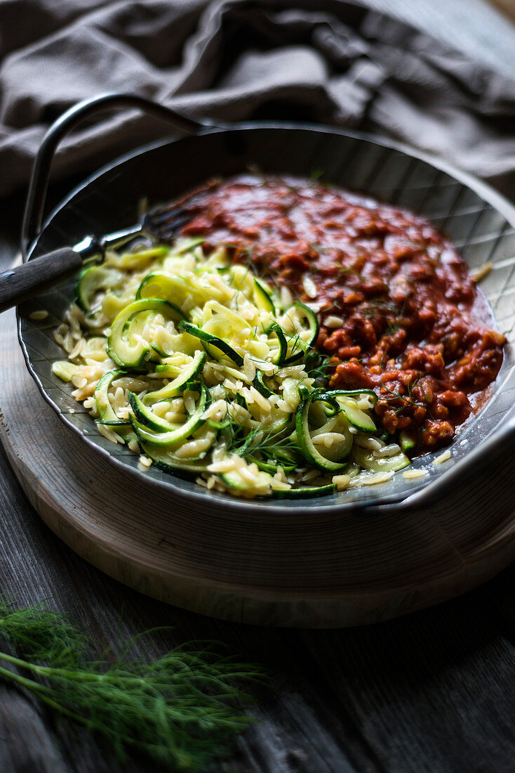 Vegan bolognese with rice noodles and courgette