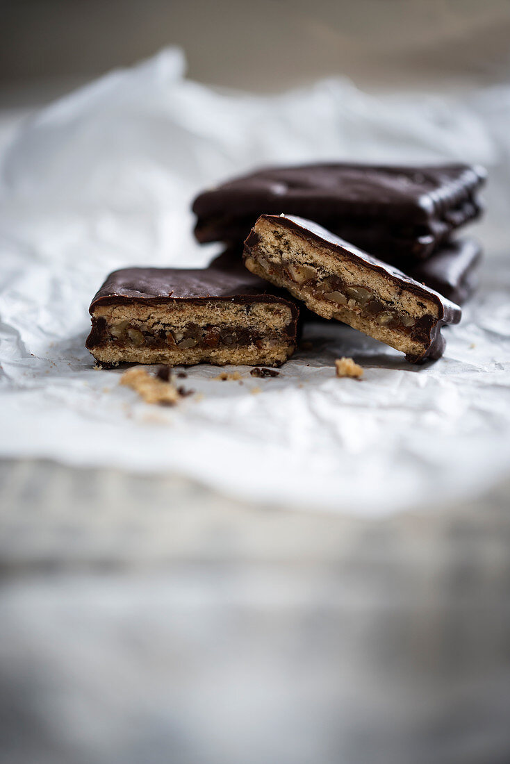 Vegan biscuits with an almond filling covered in dark chocolate