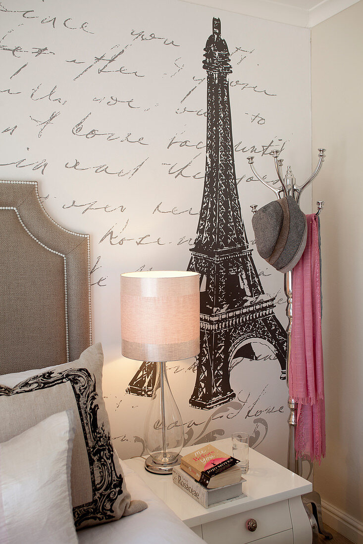 Wallpaper with pattern of French writing in bedroom
