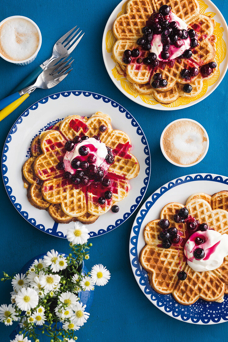 Oat breakfast waffles with blueberry elderflower compote