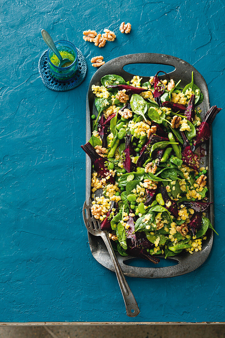 Lentil salad with beans, beetroot, spinach, walnuts and a ginger dressing