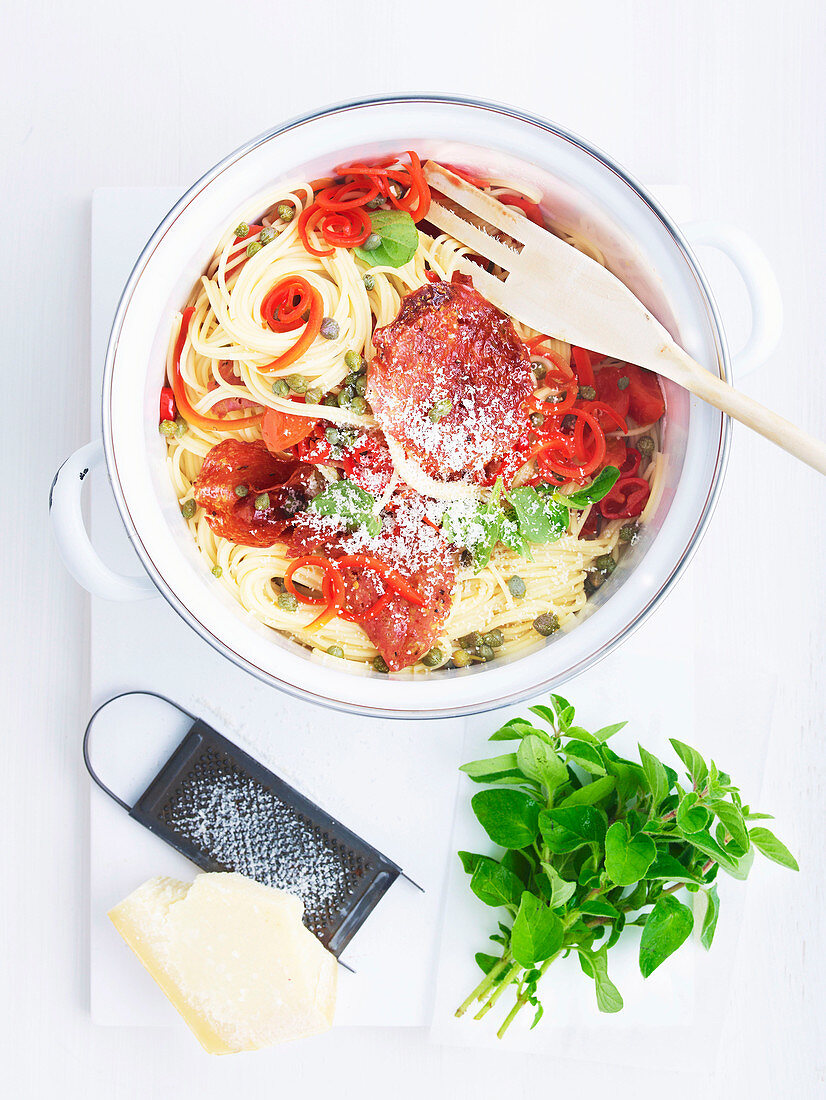 Spaghettini with spicy salami and cherry tomatoes