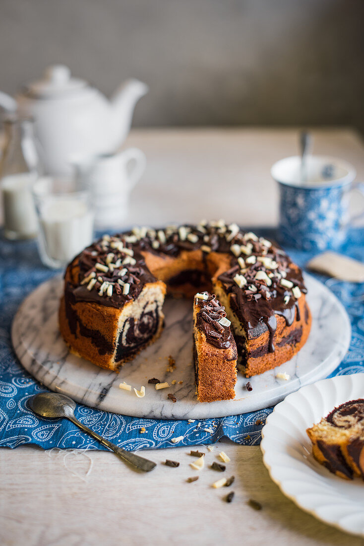 Marble cake with chocolate galze and choco curls