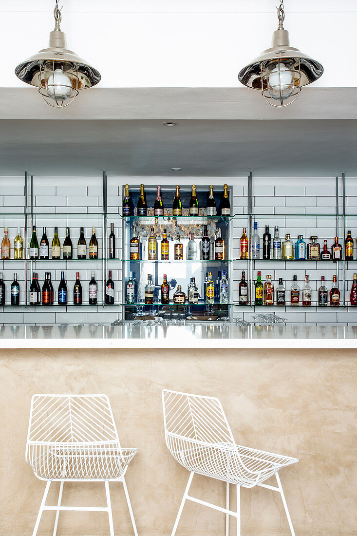Bar with glass shelves and marble counter in 'SeaBreeze', Cape Town, South Africa