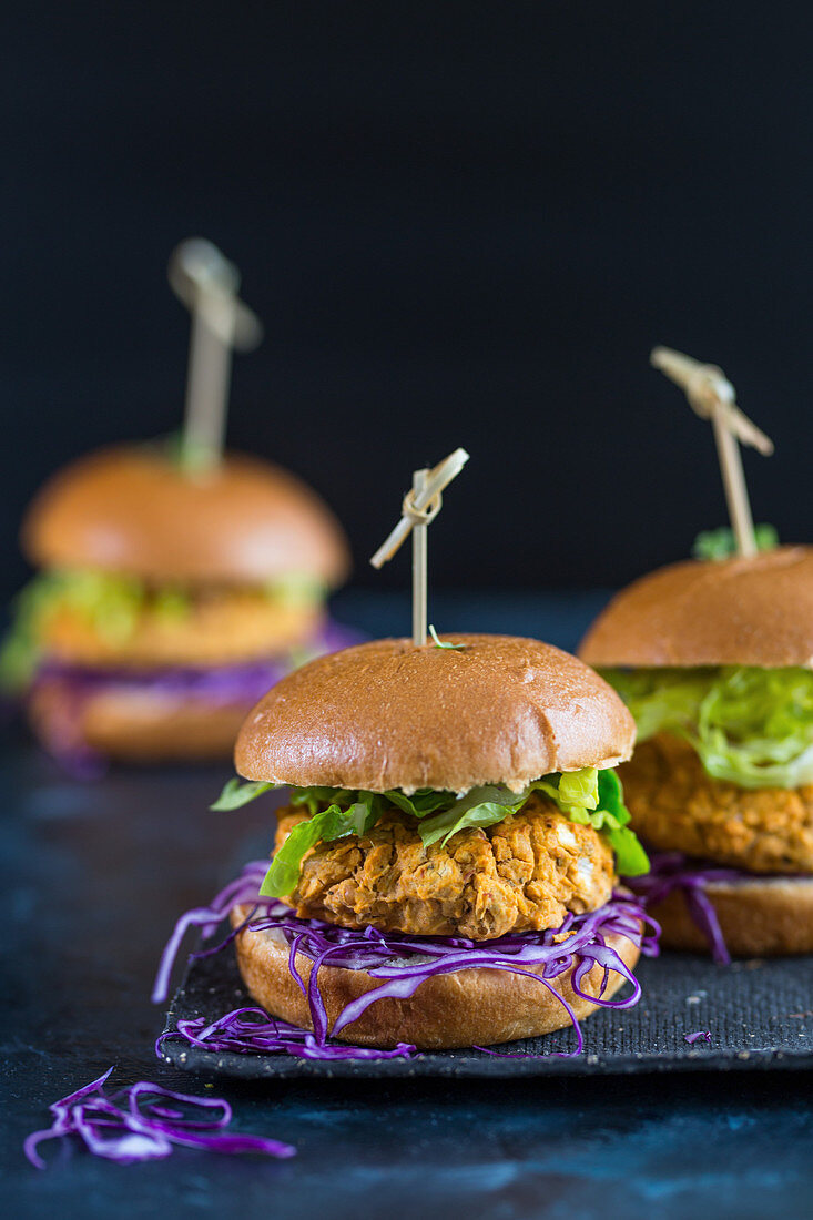Veggie burgers with butterbean patties, red cabbage and lettuce