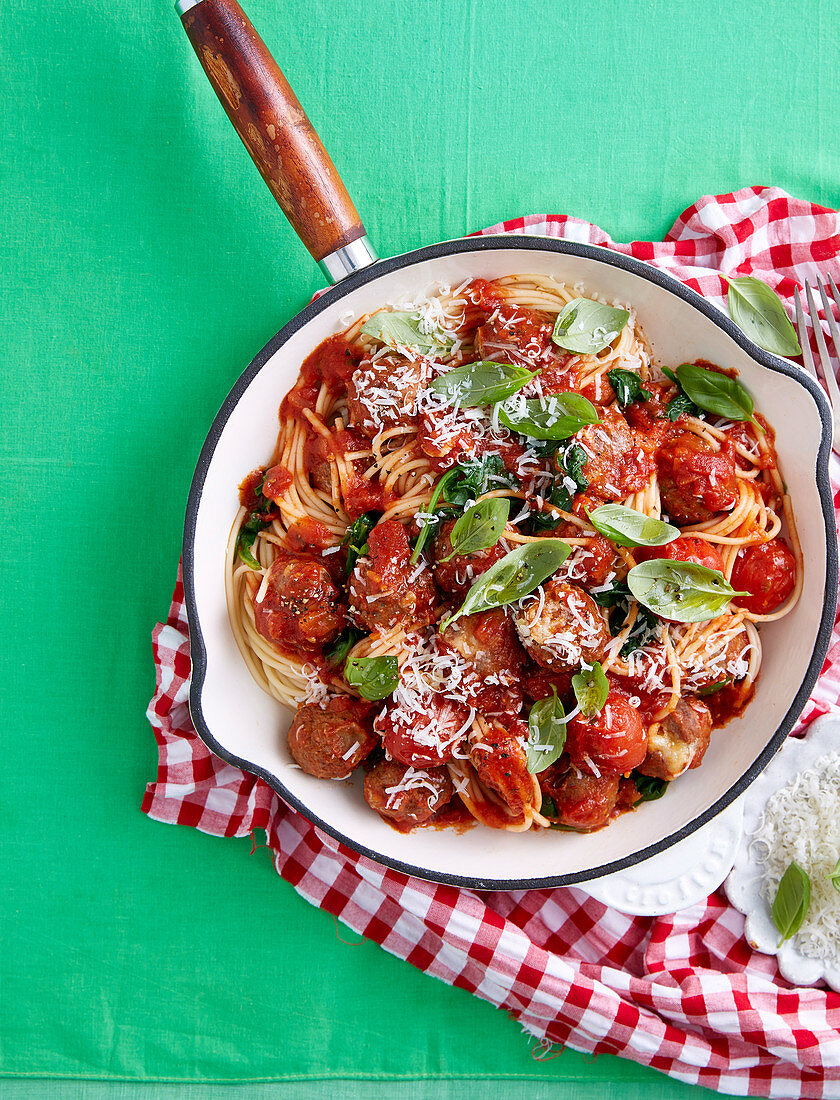 Cheese-stuffed meatballs with spaghetti