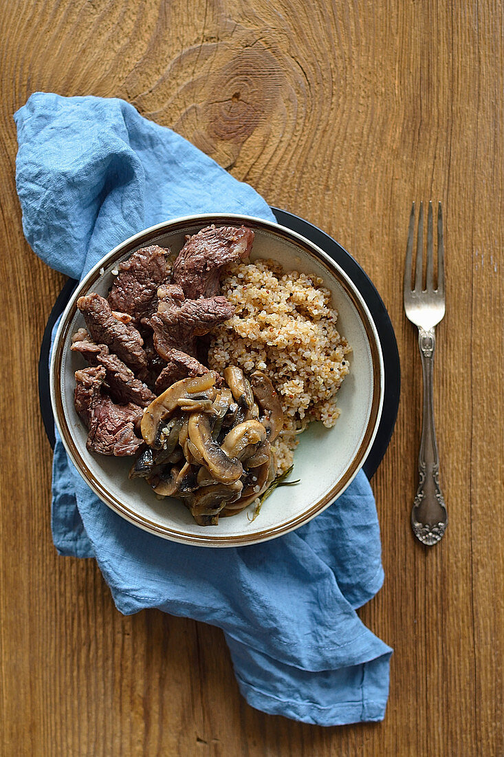 Fried beef with mushrooms