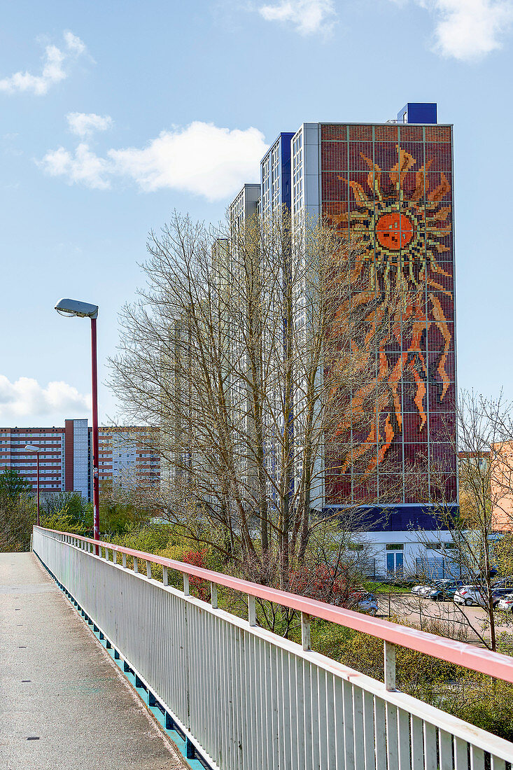 Apartment block on stilts with a giant sun relief, Evershagen, Rostock, Germany