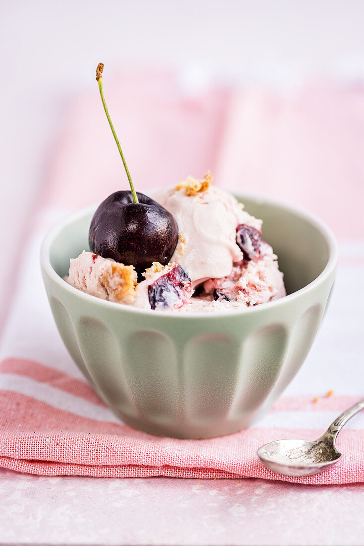Cherry ice cream with a fresh cherry