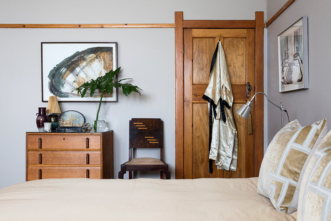 Art Deco furniture in bedroom in shades of grey and brown