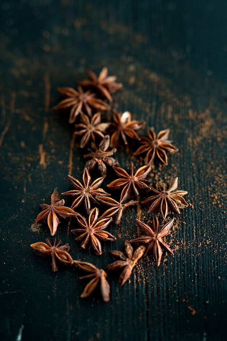 Star anise on wooden background