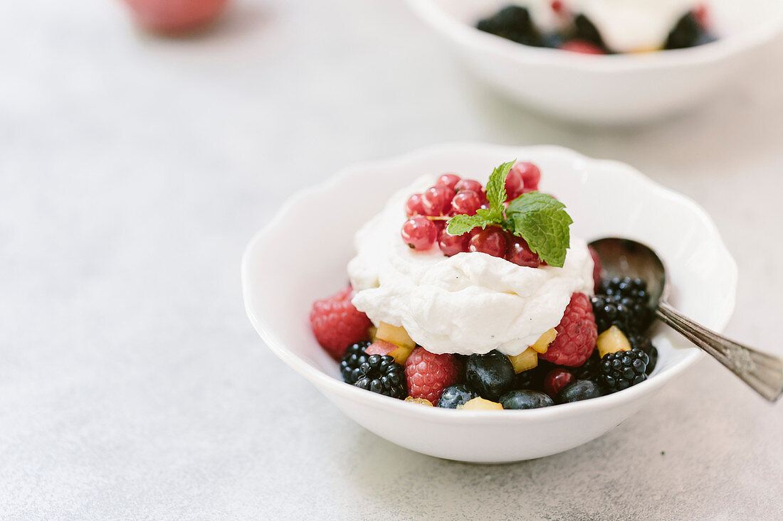 Summer fruits with whipped cream