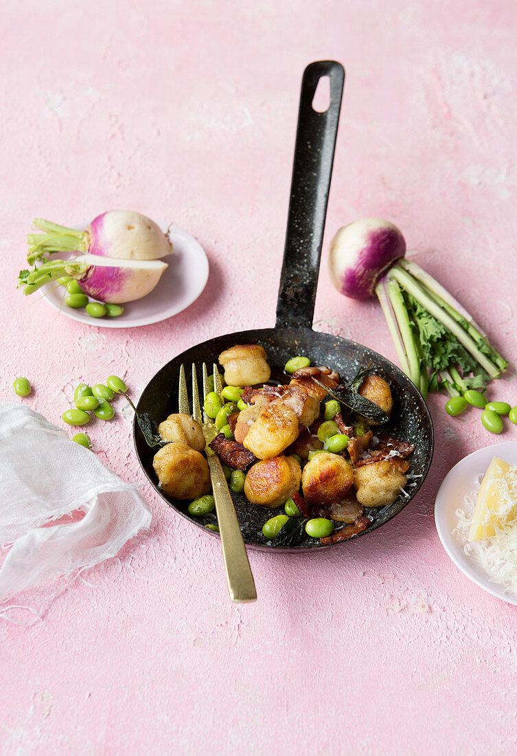 Turnip gnocchi with bacon, edamame beans and sage butter