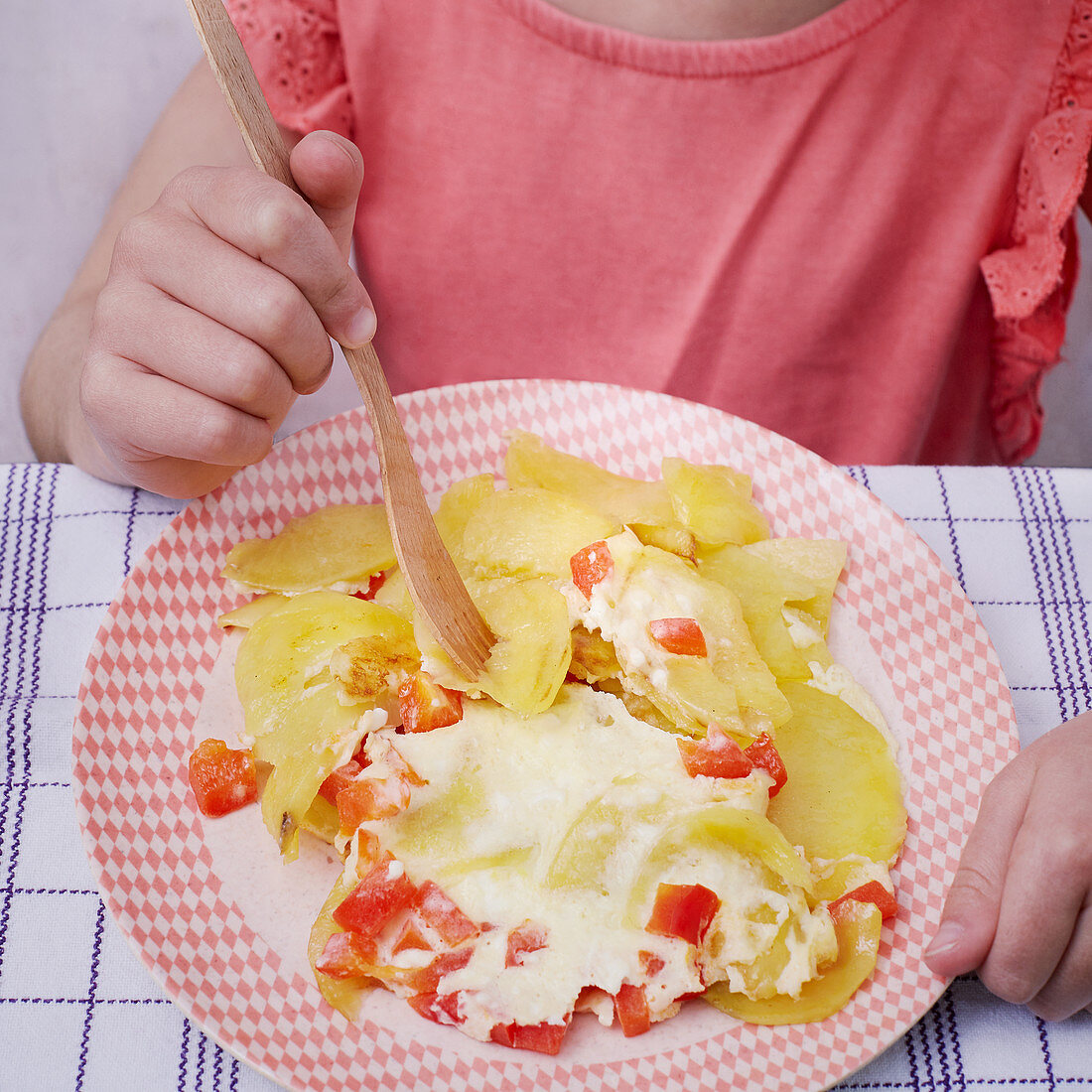 Brägele (fried potatoes from Baden) with pepper, feta cheese and egg