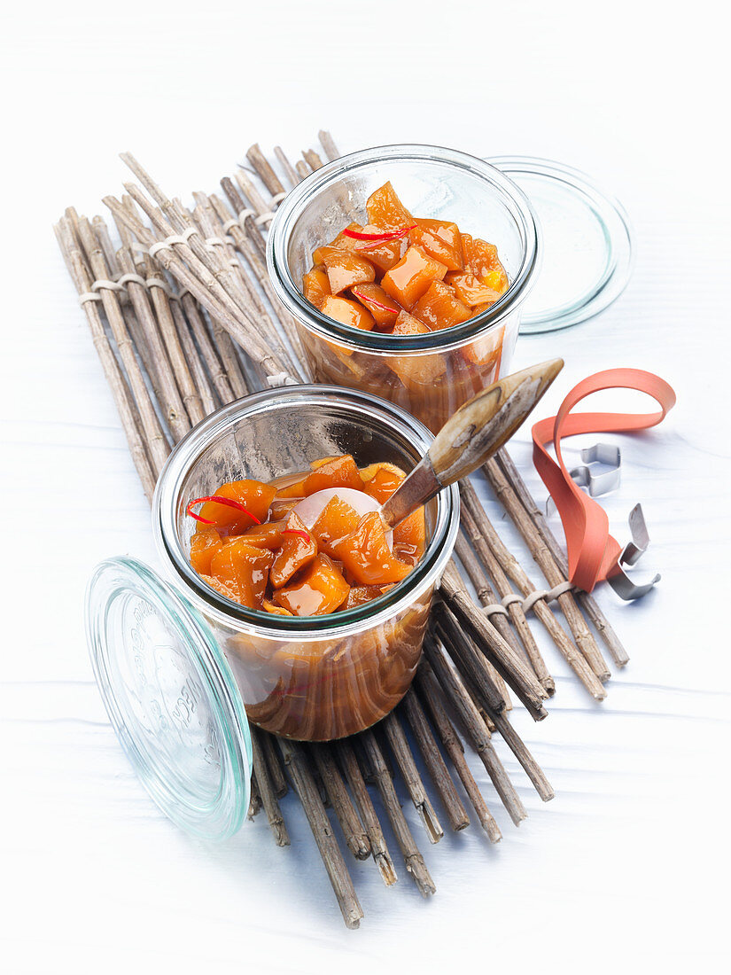 Mango chutney in glass jars