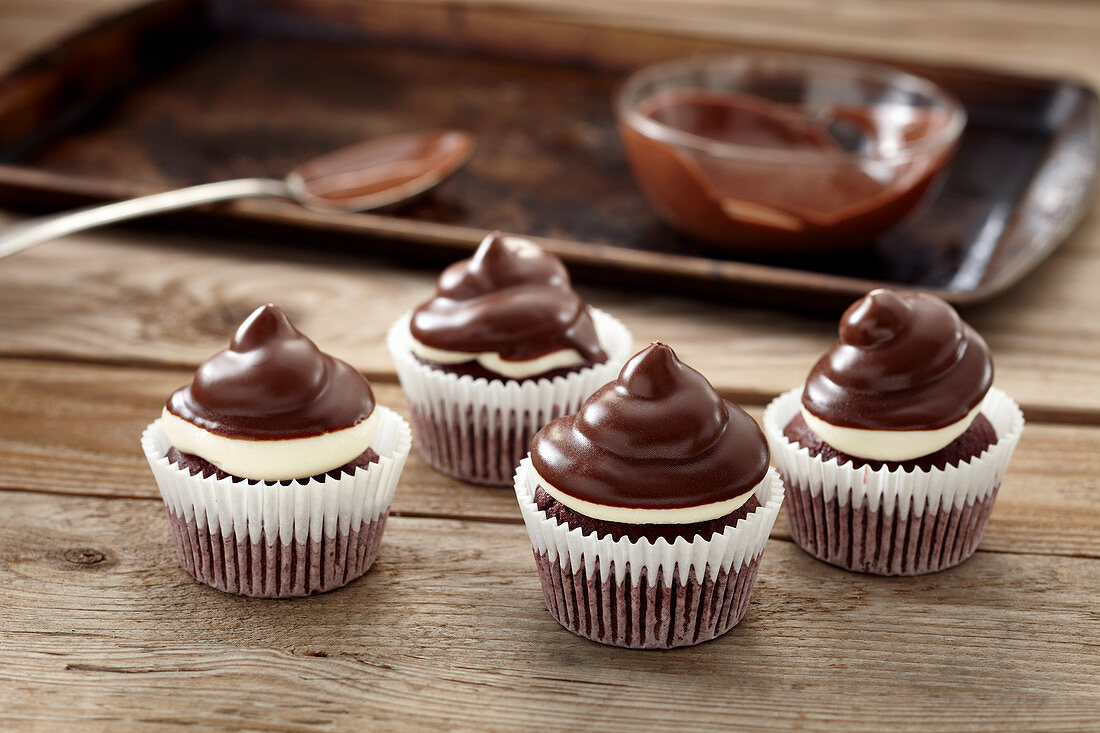Peppermint patty cupcakes on a wooden background