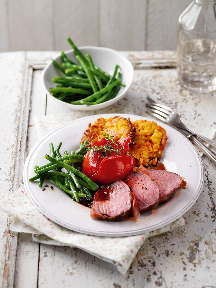 Beef fillet with green beans and potato and pumpkin fritters