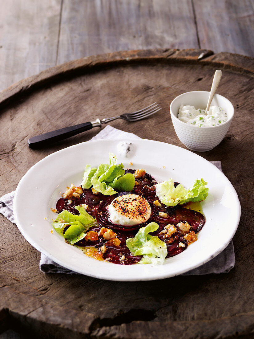 Beetroot carpaccio with a salad garnish