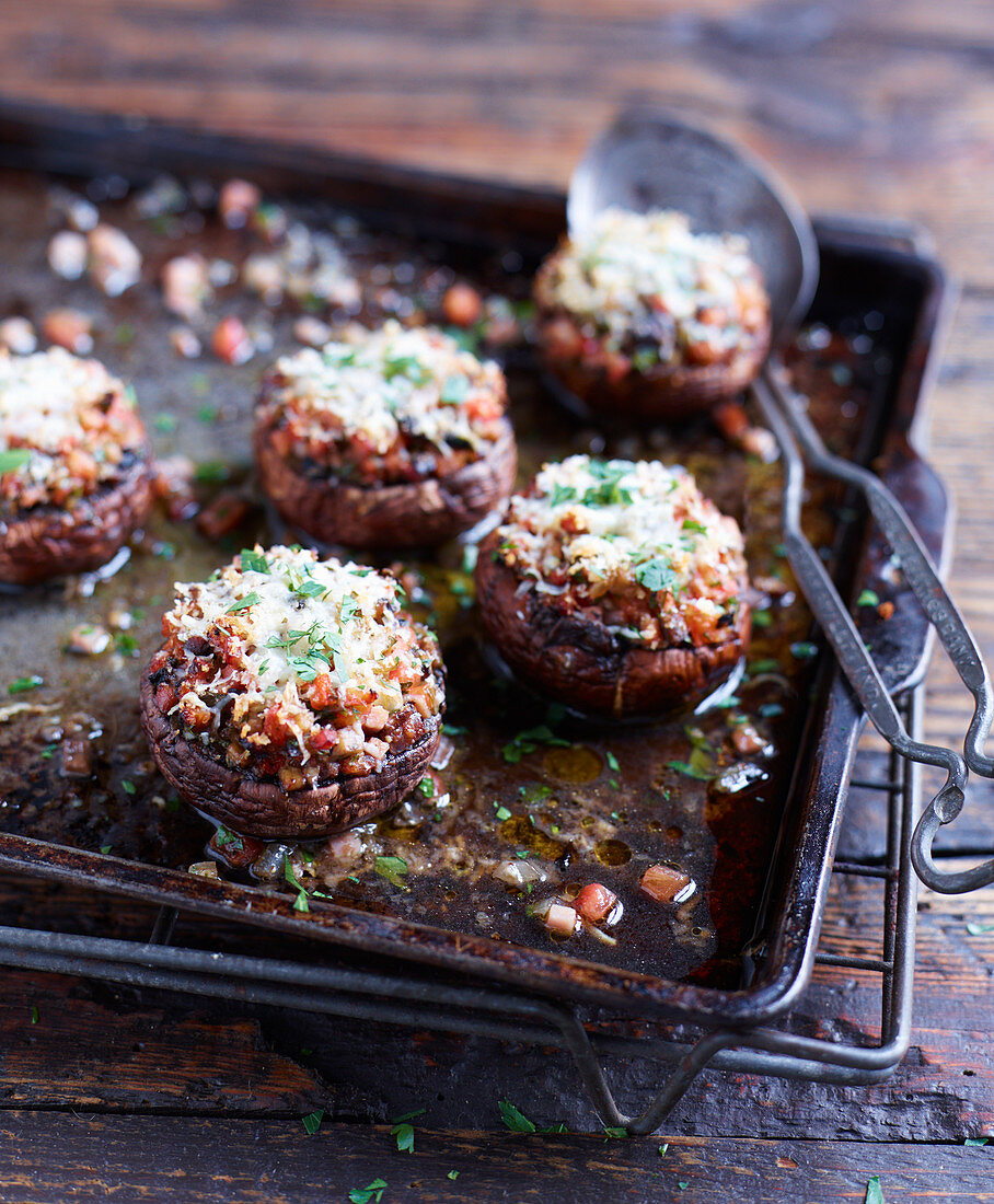 Stuffed mushrooms on a baking tray