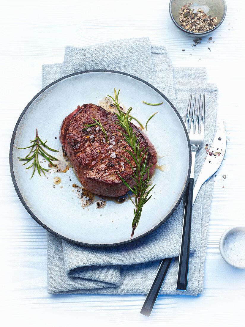 Flambéed pepper steak with rosemary