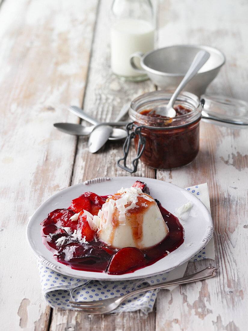 Panna cotta with stewed plums and red wine plums