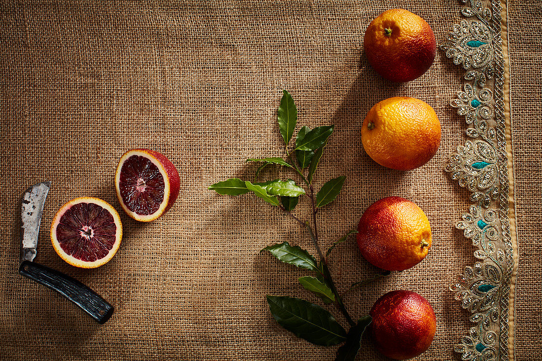Blood oranges, whole and halved