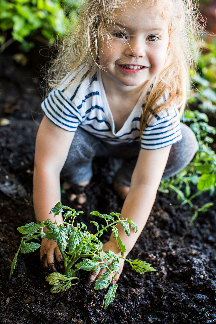 A little girl gardening