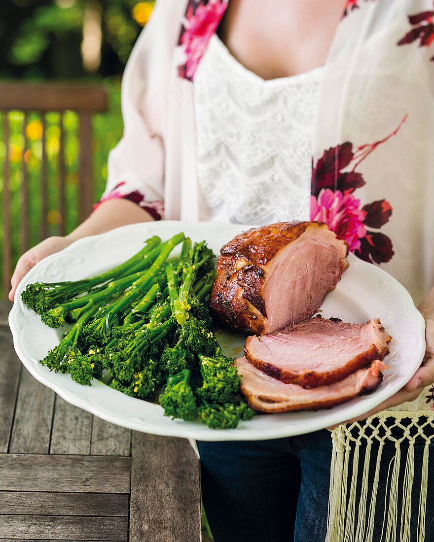 Roast ham with a ginger beer and Sriracha honey glaze, served with broccolini