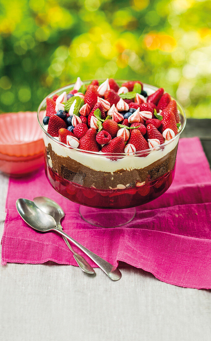 Chocolate trifle with berries, cream and cream cheese