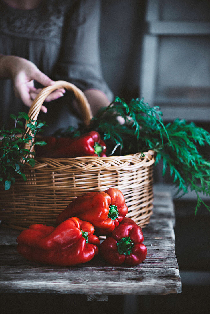 Red peppers on a rustic kitchen table