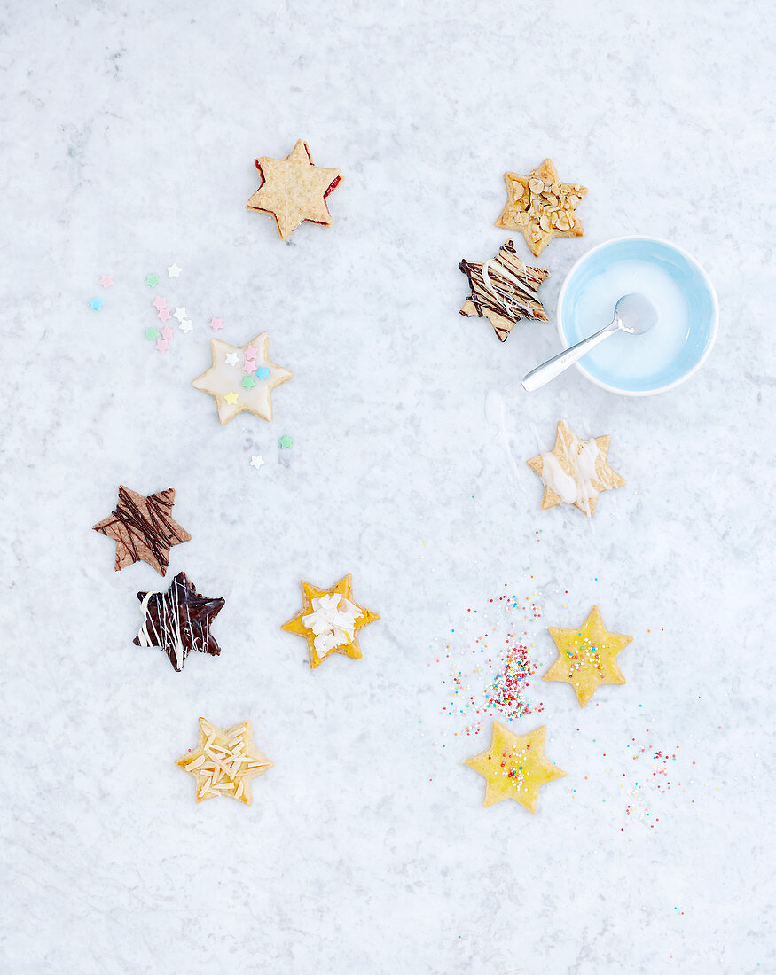 Star-shaped biscuits with various types of glaze