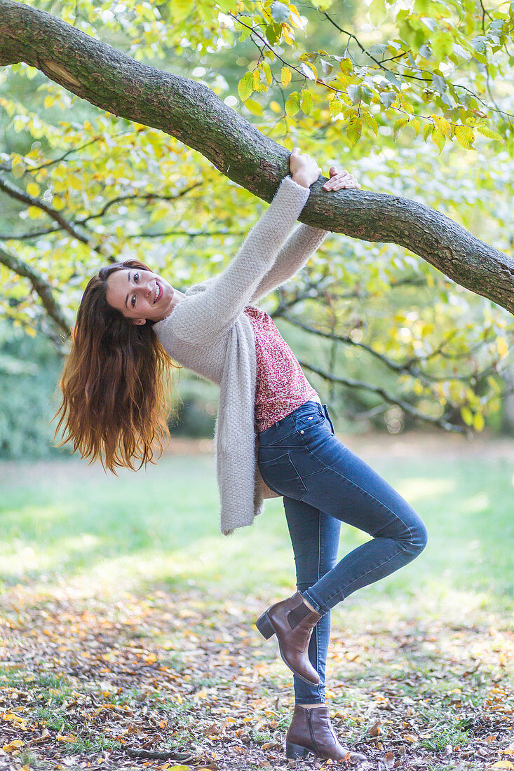 Woman hanging from a tree