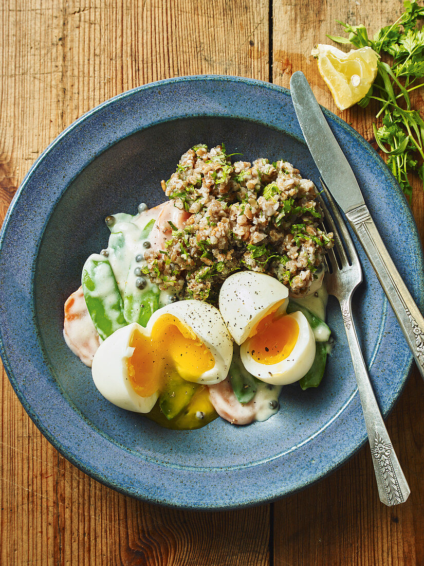 Soft-boiled eggs with herb freekah and spring vegetables