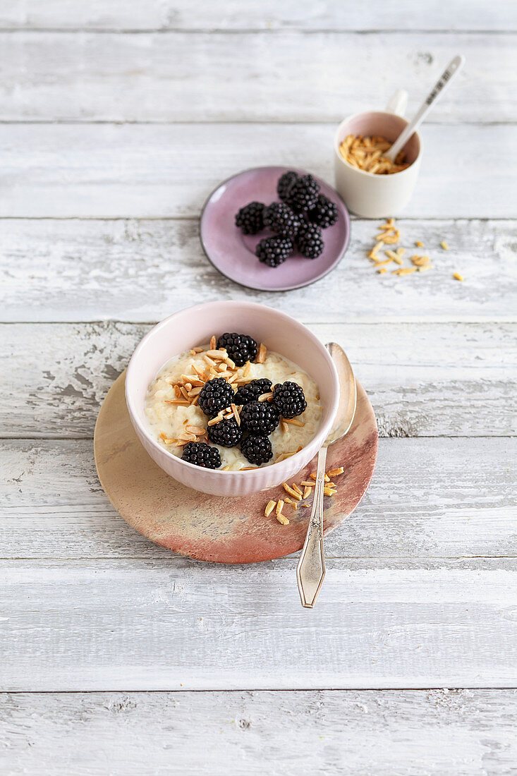 Almond milk rice pudding with fresh blackberries