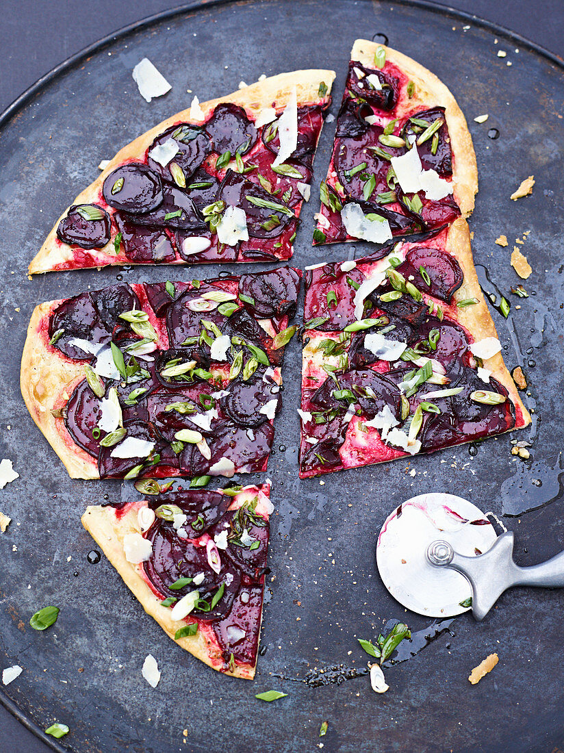 Beetroot tarte flambée with spring onions