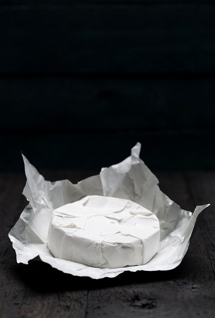 Camembert on a piece of paper