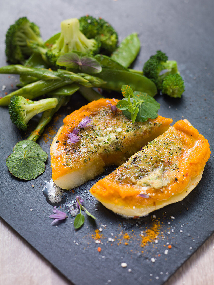 Roast celeriac with gratin carrot puree with green vegetables