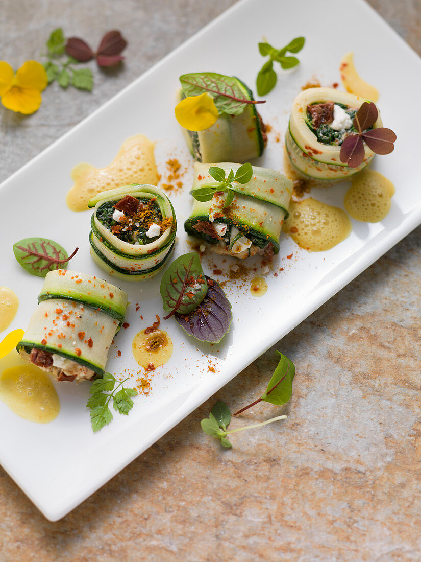 Zucchini roulade with potato curry sauce