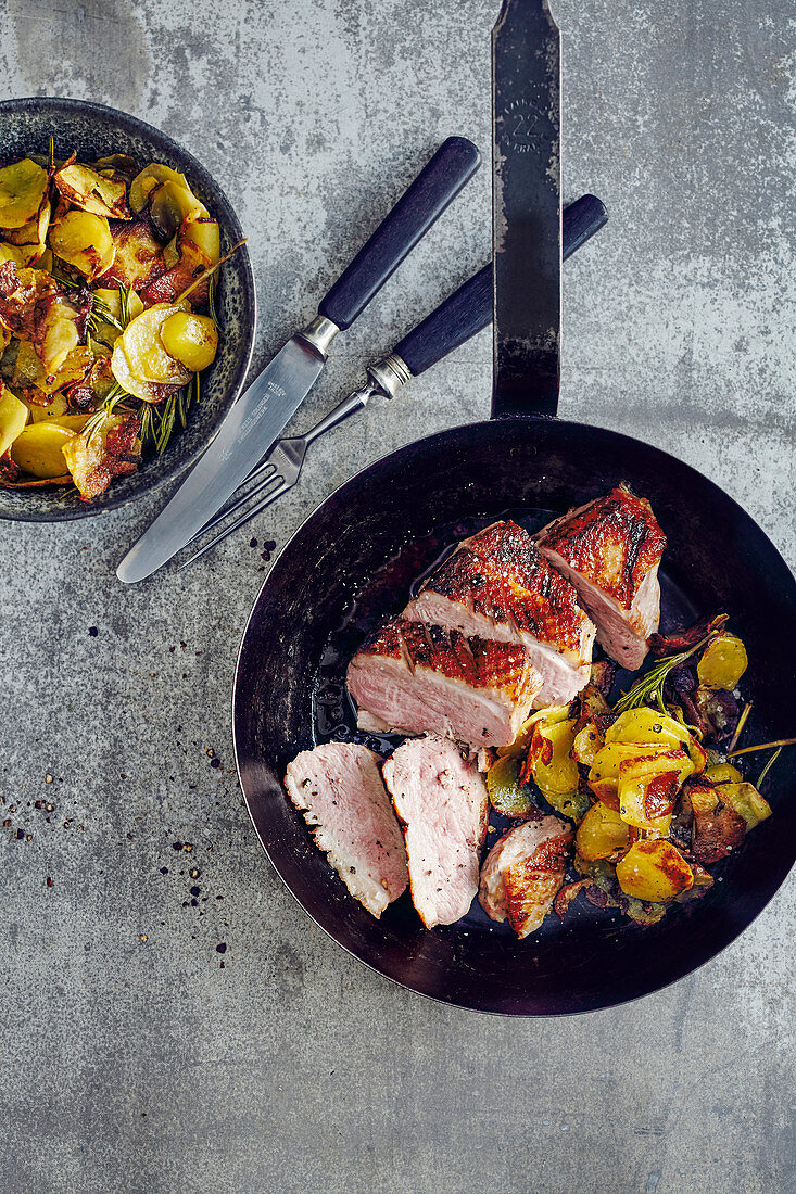 Oven-roasted duck breast with rosemary potatoes