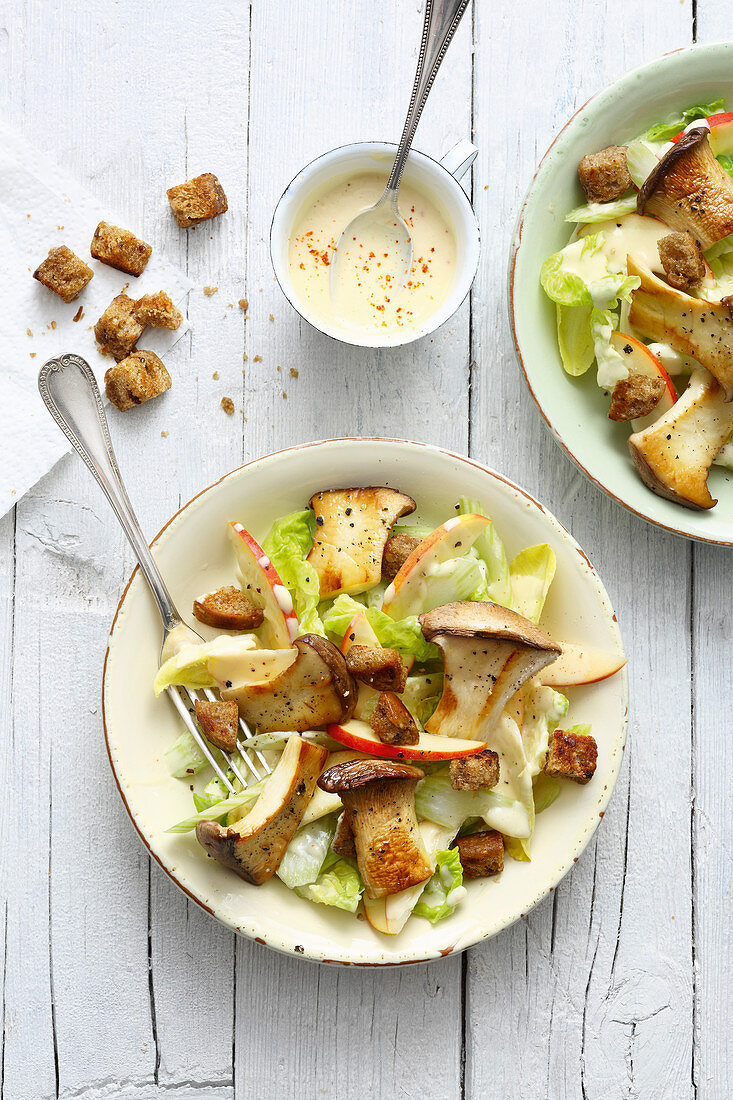 Vegan king trumpet mushroom salad with apple, croutons and a tofu dressing