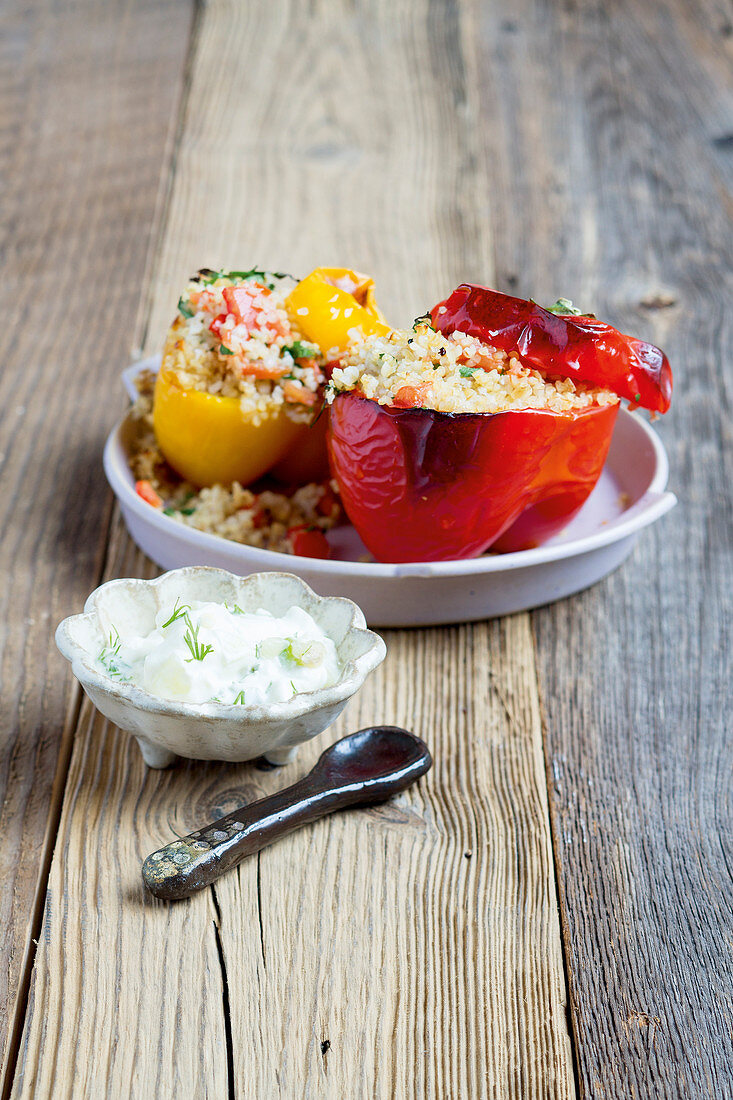 Pepper filled with bulgur served with cucumber quark