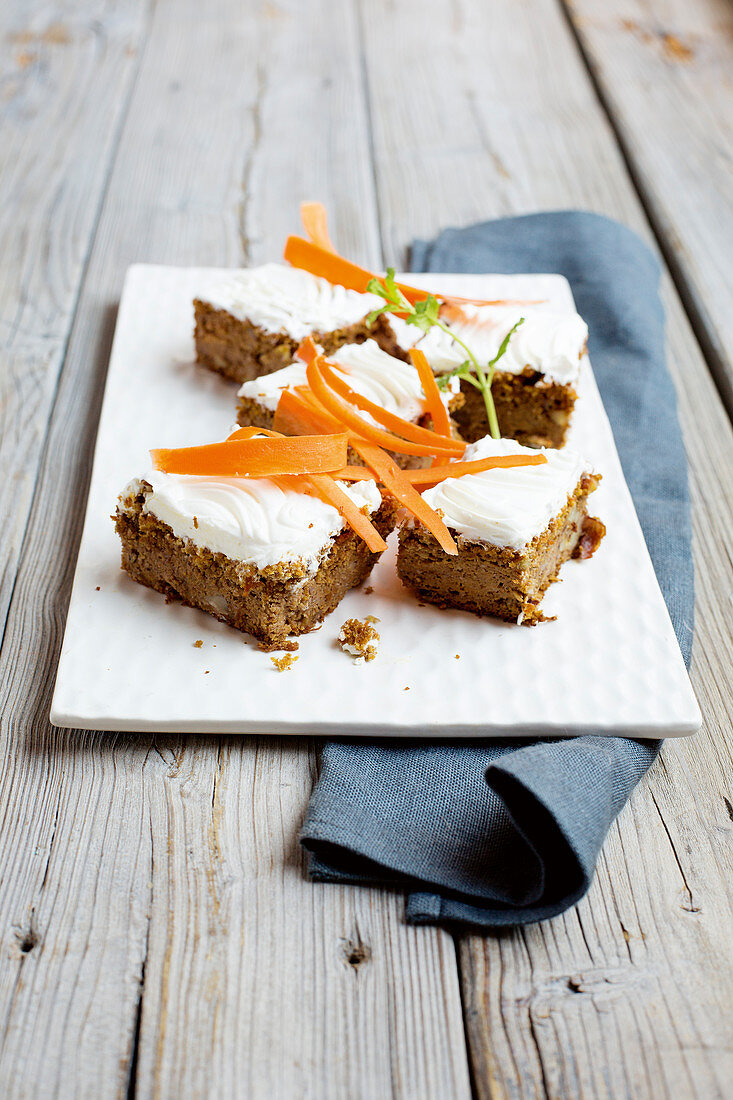 Carrot cake slices with cream cheese frosting